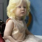 Two albino sisters from Kazakhstan born 12 years apart become modeling sensation