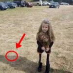 Picture of little girl holding bag of popcorn has broken the internet