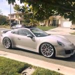 A 17-year-old boy who works part-time at Pizza Hut drives up to park in front of the house in a beautiful Porsche