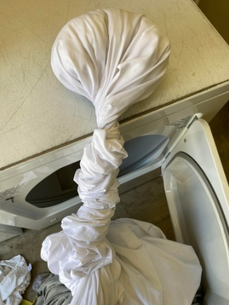 How to Prevent Sheets from Balling Up in the Dryer