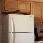 How to Optimize Storage in Your Kitchen Cabinets Above the Refrigerator