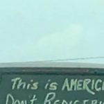 A “controversial” message on the back of an SUV sparks discussion online